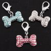 Obesek Kost2 s kristali Swarovski®