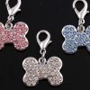 Obesek Kost1 s kristali Swarovski®